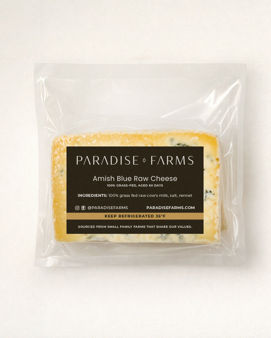 Packaged Amish Blue Raw Cheese from Paradise Farms on a white background