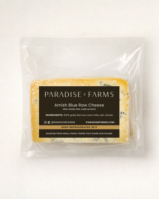 Packaged Amish Blue Raw Cheese from Paradise Farms on a white background