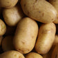 Close-up of a pile of raw potatoes